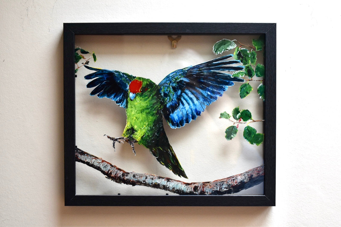 A vivid glass-layered painting of a kākāriki mid-flight—emerald body and sapphire wings unfurling as it lands delicately on a branch, surrounded by soft foliage. A moment of Aotearoa’s wild spirit, captured in bold, luminous motion.